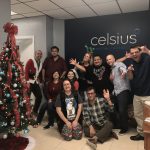 employees posing in christmas scene