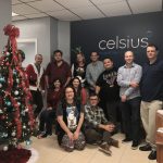 employees posing in christmas scene