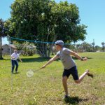 employees having fun outside for company field day