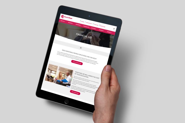 hand holding tablet showing one of the web sites we built